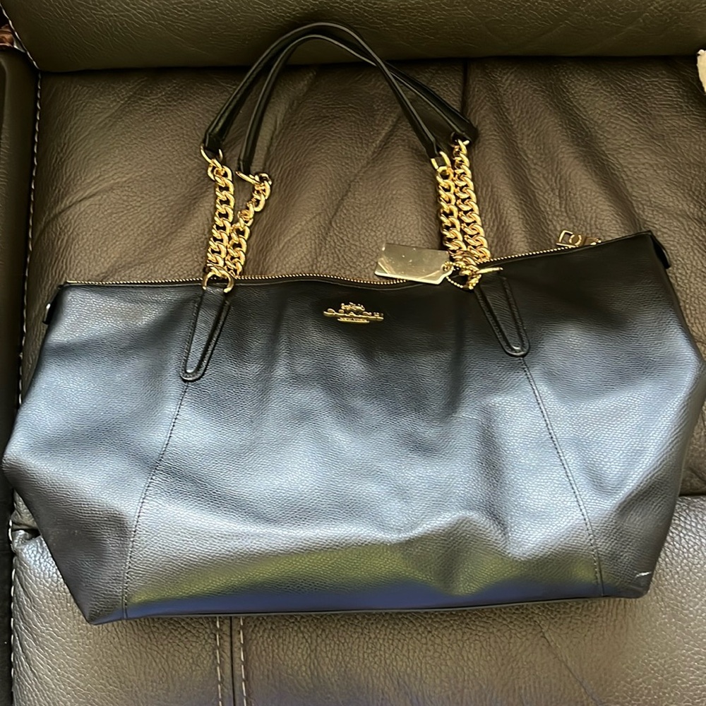 Black coach handbag with goldtone hardware